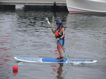  paddleboarding jousting contest, maine boats, homes and harbors